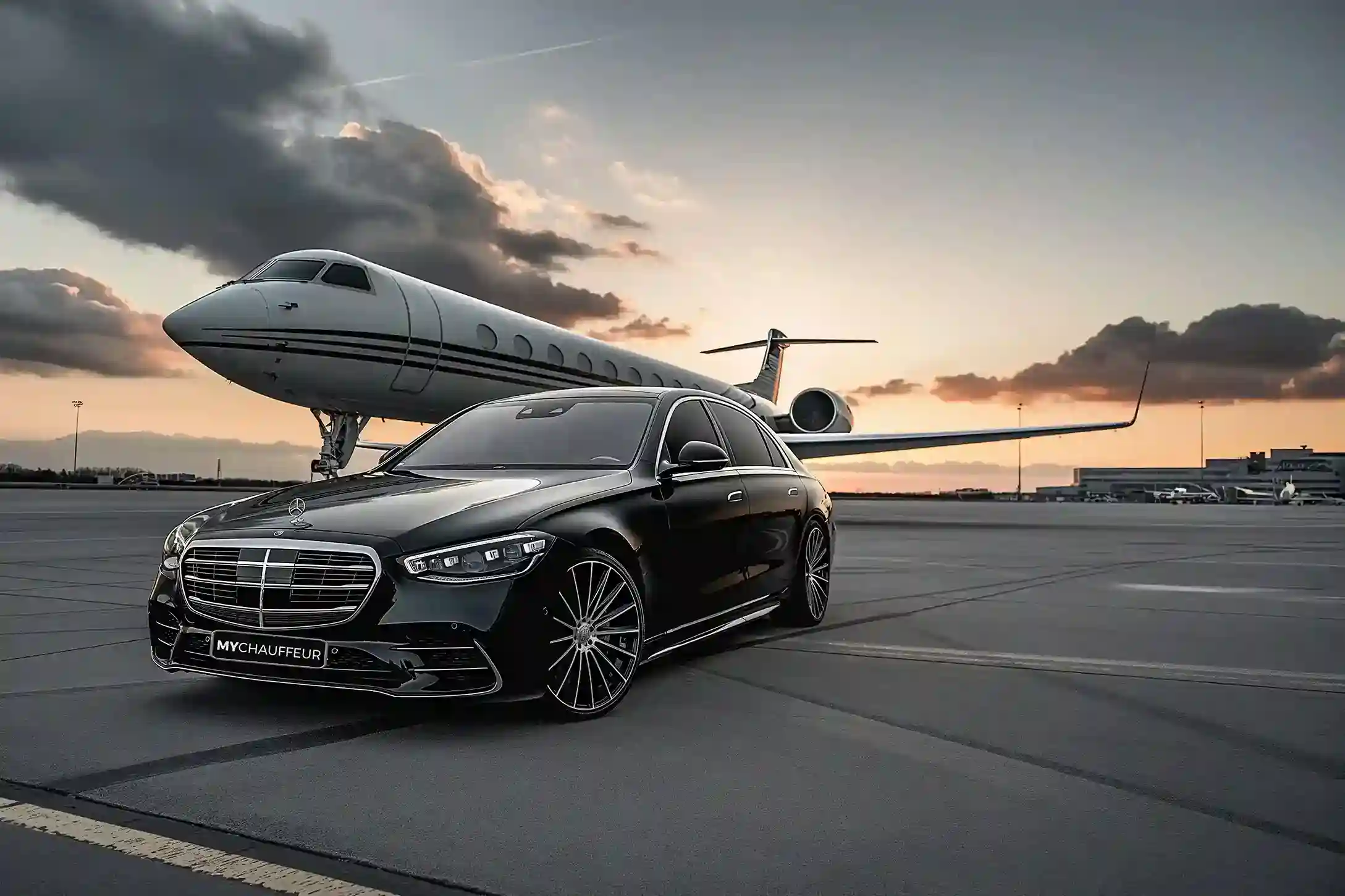Black luxury car waiting on the tarmac for an executive Boston Logan Airport transfer