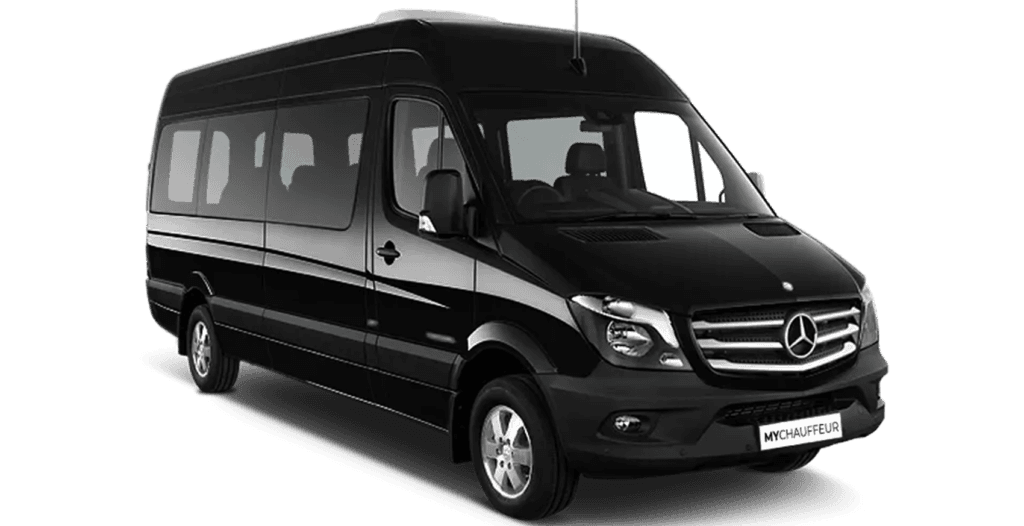 Black Mercedes-Benz minibus with silver trim and bold grille, luxury shuttle van with tinted windows and sleek silhouette for executive airport transfers