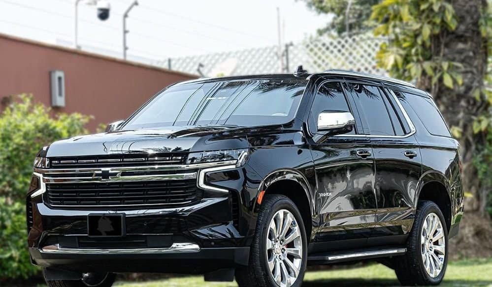 Black Chevrolet Tahoe SUV from Boston Luxury Chauffeur Service with chrome accents, large wheels, and a premium luxury interior ideal for executive travel.