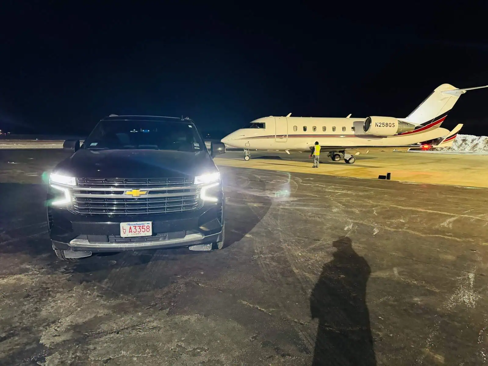 Black SUV at Boston Logan Airport for luxury chauffeur transfer